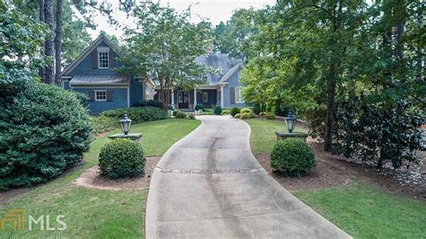 This home last sold for 850,000 in March 2021. . Zillow greensboro ga